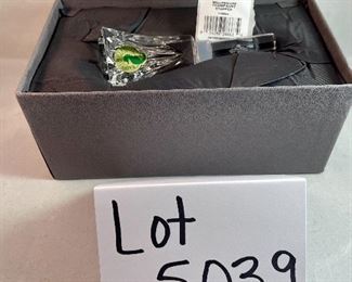 Lot 5039.  $18.00  New in Box.  Waterford Crystal Millennium Champagne Stopper. 4.5" H. We have only 4 Left!  Indicate how many you want when ordering.  Another sweet gift!