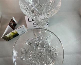 Lot 5040. $50.00  Pair of Waterford Crystal Millennium Champagne Flutes 9.25" x 3.25"at the top. No box. One flute is the Universal Wishes Flute, it includes all 5 of the toasting themes of the Millennium collection, the other flute is happiness. 
