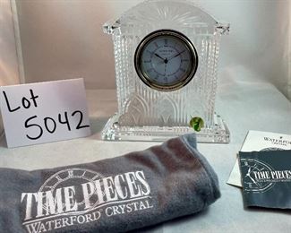 Lot 5042. $50.00  Waterford Crystal Westminster Mantle Clock, lead crystal, heavy. New vintage with box and dust cover. 6.5" w x 7"h x 1.75"d