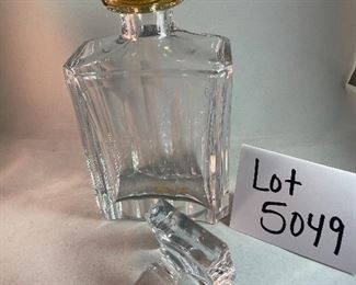 Lot 5049. $190.00 Beautiful Ralph Lauren Crystal Edward Gold Decanter (9" H  x 4.75" W  x  2.5" D) this decanter alone sold on ebay for $249 in December. Also included are these 2 Waterford glasses- one Waterford Marquis Wine Glass (9.24" H), and one Waterford Coupe/Sherbet Glass (possibly Kildare pattern), (5.25" W x 3.75" diameter). No boxes.