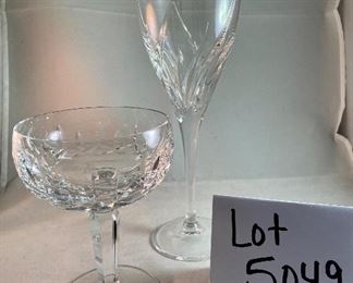 Lot 5049. $190.00 Beautiful Ralph Lauren Crystal Edward Gold Decanter (9" H  x 4.75" W  x  2.5" D) this decanter alone sold on ebay for $249 in December. Also included are these 2 Waterford glasses- one Waterford Marquis Wine Glass (9.24" H), and one Waterford Coupe/Sherbet Glass (possibly Kildare pattern), (5.25" W x 3.75" diameter). No boxes.