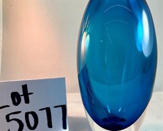 Lot 5077. $100.00  Gorgeous Paul Harrie Teal/Azure/Clear Art Glass Vase. 7.75" H x 4" W Signed. teardrop shape. Paul Harrie had his own studio in Southern California since 1980 and he passed in 2016.  His work is acclaimed worldwide,  We have 1 of these available,  