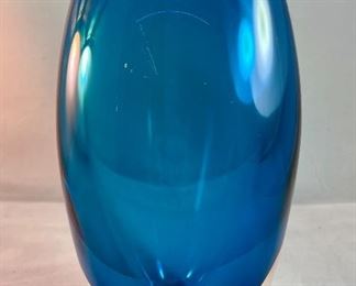 Lot 5077. $100.00  Gorgeous Paul Harrie Teal/Azure/Clear Art Glass Vase. 7.75" H x 4" W Signed. teardrop shape. Paul Harrie had his own studio in Southern California since 1980 and he passed in 2016.  His work is acclaimed worldwide,  We have 1 of these available,  