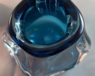 Lot 5078. $110.00   Another Beautiful Paul Harrie Art Glass Vase. "Athena" in Azure/Teal. Small  6" H x  3" opening x 7" W.  Paul Harrie had his own studio in Southern California since 1980 and he passed in 2016.  His work is acclaimed worldwide,  We have 1 of these available,   