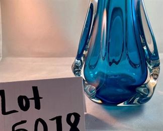 Lot 5078. $110.00   Another Beautiful Paul Harrie Art Glass Vase. "Athena" in Azure/Teal. Small  6" H x  3" opening x 7" W.  Paul Harrie had his own studio in Southern California since 1980 and he passed in 2016.  His work is acclaimed worldwide,  We have 1 of these available,   