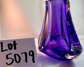 Lot 5079. $110.00   Another Beautiful Paul Harrie Art Glass Vase. "Athena" in Purple.. Small  6" H  x  3" W opening x 7" D.  Paul Harrie had his own studio in Southern California since 1980 and he passed in 2016.  His work is acclaimed worldwide,  We have only 1 of these available,   