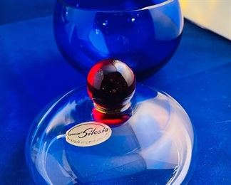 Lot 5086. $48.00  2 Pieces of vintage mod Kaspar Selesia Art Glass, this grouping includes a clear covered bowl on cobalt base with ruby stem (7" H x 5" W) & Kaspar Selesia Art Glass covered cobalt bowl w/clear glass cover and ruby knob (4.5"H x 3"W). Made in Germany.