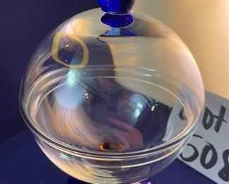 Lot 5086. $48.00  2 Pieces of vintage mod Kaspar Selesia Art Glass, this grouping includes a clear covered bowl on cobalt base with ruby stem (7" H x 5" W) & Kaspar Selesia Art Glass covered cobalt bowl w/clear glass cover and ruby knob (4.5"H x 3"W). Made in Germany.