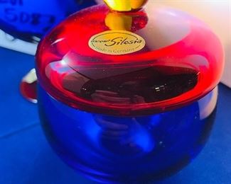 Lot 5087. $48.00   2 pieces of Vintage Mod Kaspar Selesia Art Glass Includes:  Covered Pedestal Bowl, Cobalt bowl with ruby glass cover and base knob is citrine color (7" H x 5" Diameter) and the Small Covered Cobalt Bowl .w/ Ruby Red Lid and Citrine Ball Handle 4.5" H  x 3"diameter.   We have 2 pairs of these available.