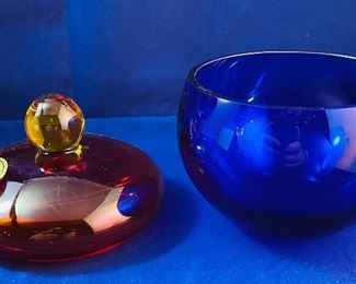Lot 5087. $48.00   2 pieces of Vintage Mod Kaspar Selesia Art Glass Includes:  Covered Pedestal Bowl, Cobalt bowl with ruby glass cover and base knob is citrine color (7" H x 5" Diameter) and the Small Covered Cobalt Bowl .w/ Ruby Red Lid and Citrine Ball Handle 4.5" H  x 3"diameter.   We have 2 pairs of these available.