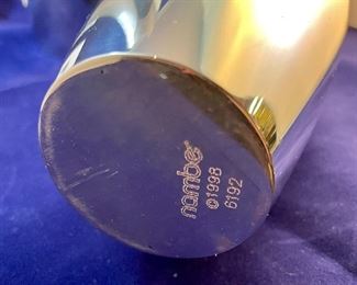 Lot 5088. $40.00 Nambe Spiral Vase 10.5" H (1998)  Designed by Smith Celentano (#6192) (sorry no box). Recognized for its award-winning designs for more than 60 years, Nambé’s commitment to timeless beauty, artistic integrity and uncompromising quality is evident in the brand’s collection of serveware, barware, home décor and gift items. 