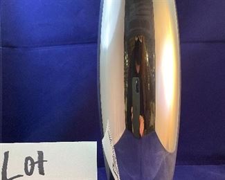 Lot 5088. $40.00 Nambe Spiral Vase 10.5" H (1998)  Designed by Smith Celentano (#6192) (sorry no box). Recognized for its award-winning designs for more than 60 years, Nambé’s commitment to timeless beauty, artistic integrity and uncompromising quality is evident in the brand’s collection of serveware, barware, home décor and gift items. 