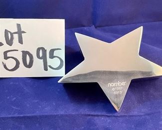 Lot 5095. $24.00. Nambé Star Column Paperweight 3.5"t.  Nambé (style 6913), this same paperweight is available at Needless Markup, oops I mean Neiman Marcus for $85!  	3.5". If this looks familiar, we did sell some of the Nambé pieces at one of our prior sales!  