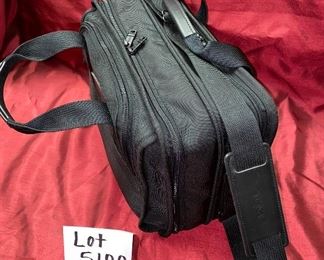 Lot 5100. $175.00. New in the Box. Tumi Black Ballistic Nylon --NEW-- Briefcase. 3 compartments	14"w x 6"d x 11"t - We swear by Tumi.  It's built to last.