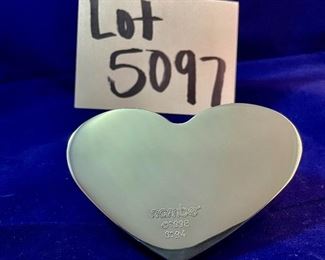 Lot 5097.   $30.00  A Pair of Nambé #6194 Heart Paperweights. 1994 (one shows signs of wear, one is in excellent shape)	4"x2"w