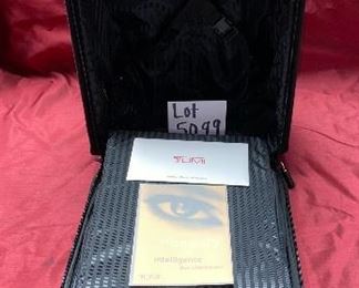 Lot 5099. Asking $325.00. Tumi Black New Ballistic Nylon Wheel-a-Way Vertical Office. Style 2205 New With Tags and original and Box  MSRP: $595.00	13.5" x 20" x 8"