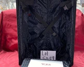 Lot 5099. Asking $325.00. Tumi Black New Ballistic Nylon Wheel-a-Way Vertical Office. Style 2205 New With Tags and original and Box  MSRP: $595.00	13.5" x 20" x 8"