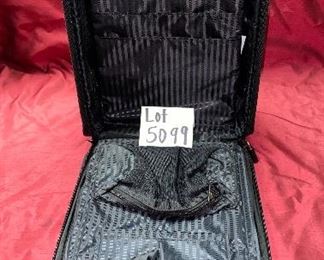 Lot 5099. Asking $325.00. Tumi Black New Ballistic Nylon Wheel-a-Way Vertical Office. Style 2205 New With Tags and original and Box  MSRP: $595.00	13.5" x 20" x 8"