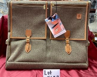 Lot 5102. Asking $100.00.   Brand New in Box Hartmann American Classics Tweed Collection. 44"  4-Suiter. New with Tags and original box,