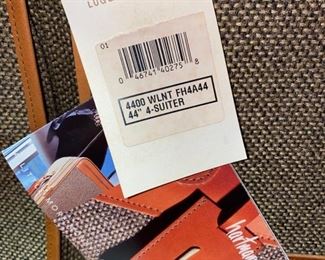 Lot 5102. Asking $100.00.   Brand New in Box Hartmann American Classics Tweed Collection. 44"  4-Suiter. New with Tags and original box,