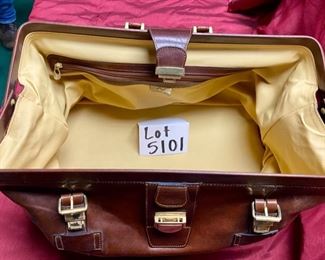Lot 5101. Asking $250.00. Alessandro Venanzi Made in Italy Brown Leather Exterior with tan leather interior Travel Satchel.   #9970.  Zipper bottom compartment	19"w x 12"d x 12"t.  Clearly the nicest piece of luggage we will ever have the opportunity to sell.  Vintage, Fabulous.  I told Steve this looks like something James Bond would carry!  Original Price over $1200.00