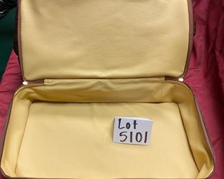 Lot 5101. Asking $250.00. Alessandro Venanzi Made in Italy Brown Leather Exterior with tan leather interior Travel Satchel.   #9970.  Zipper bottom compartment	19"w x 12"d x 12"t.  Clearly the nicest piece of luggage we will ever have the opportunity to sell.  Vintage, Fabulous.  I told Steve this looks like something James Bond would carry! Original Price over $1200.00.  Photo of bottom section.