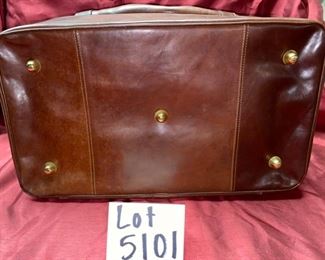 Lot 5101. Asking $250.00. Alessandro Venanzi Made in Italy Brown Leather Exterior with tan leather interior Travel Satchel.   #9970.  Zipper bottom compartment	19"w x 12"d x 12"t.  Clearly the nicest piece of luggage we will ever have the opportunity to sell.  Vintage, Fabulous.  I told Steve this looks like something James Bond would carry!  Original Price over $1200.00