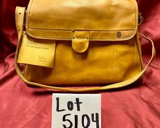 Lot 5104. $50.00 Vintage Hartmann Belting LeatherTravel Tote w/Shoulder Strap. Zipper Compartments Messenger Style Flap.	Nylon Khaki Lining. 15"W x 6"D x 9"H.