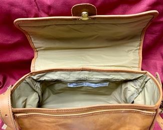 Lot 5104. $50.00 Vintage Hartmann Belting LeatherTravel Tote w/Shoulder Strap. Zipper Compartments Messenger Style Flap.	Nylon Khaki Lining. 15"W x 6"D x 9"H.