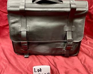 Lot 5108. $250.00  Porsche Design Black Leather Saddlebag Style Carry On 2 compartments, Zipper Pocket, Excellent Condition!  20" W x 15" H,  4"D.  Similar Porsche Design Leather Bags sell for $500-750.