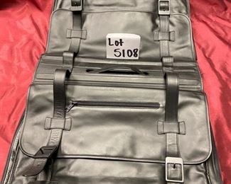 Lot 5108. $250.00  Porsche Design Black Leather Saddlebag Style Carry On 2 compartments, Zipper Pocket, Excellent Condition!  20" W x 15" H,  4"D.  Similar Porsche Design Leather Bags sell for $500-750.