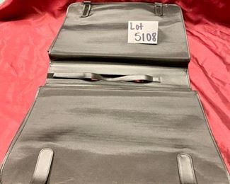 Lot 5108. $250.00  Porsche Design Black Leather Saddlebag Style Carry On 2 compartments, Zipper Pocket, Excellent Condition!  20" W x 15" H,  4"D.  Similar Porsche Design Leather Bags sell for $500-750.