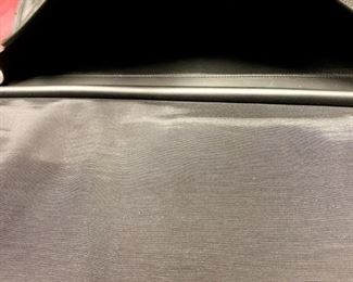 Lot 5108. $250.00  Porsche Design Black Leather Saddlebag Style Carry On 2 compartments, Zipper Pocket, Excellent Condition!  20" W x 15" H,  4"D.  Similar Porsche Design Leather Bags sell for $500-750.