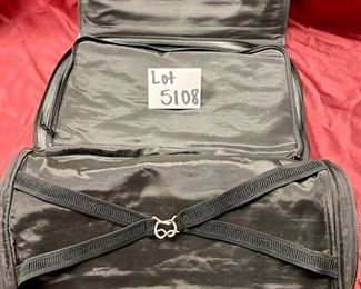 Lot 5108. $250.00  Porsche Design Black Leather Saddlebag Style Carry On 2 compartments, Zipper Pocket, Excellent Condition!  20" W x 15" H,  4"D.  Similar Porsche Design Leather Bags sell for $500-750.