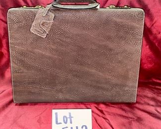 Lot 5112. $52.00 Light Brown Pebble  Leather Briefcase w/locks. Tan Leather Interior (Interior Zips are rough to pull). Excellent Condition and nice interior compartment.  16.5" W x 12" D x 4" H