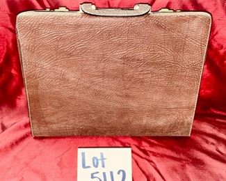 Lot 5112. $52.00 Light Brown Pebble  Leather Briefcase w/locks. Tan Leather Interior (Interior Zips are rough to pull). Excellent Condition and nice interior compartment.  16.5" W x 12" D x 4" H