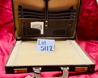 Lot 5112. $52.00 Light Brown Pebble  Leather Briefcase w/locks. Tan Leather Interior (Interior Zips are rough to pull). Excellent Condition and nice interior compartment.  16.5" W x 12" D x 4" H