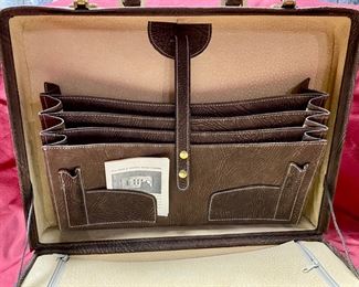 Lot 5112. $52.00 Light Brown Pebble  Leather Briefcase w/locks. Tan Leather Interior (Interior Zips are rough to pull). Excellent Condition and nice interior compartment.  16.5" W x 12" D x 4" H