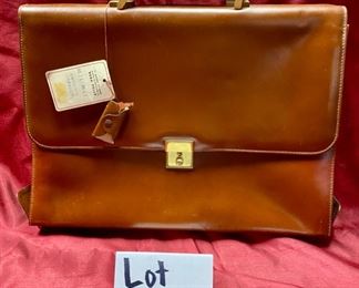 Lot 5113. $125.00  Like New Vera Pelle Leather Briefcase and Lock Anticato Tobacco Color. 4 compartments 1 zipper pocket. Made in Italy. 15.5" W x 12" H x 2.5" D