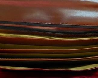 Lot 5113. $125.00  Like New Vera Pelle Leather Briefcase and Lock Anticato Tobacco Color. 4 compartments 1 zipper pocket. Made in Italy. 15.5" W x 12" H x 2.5" D