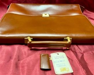 Lot 5113.  $125.00  Like New Vera Pelle Leather Briefcase and Lock Anticato Tobacco Color. 4 compartments 1 zipper pocket. Made in Italy. 15.5" W x 12" H x 2.5" D