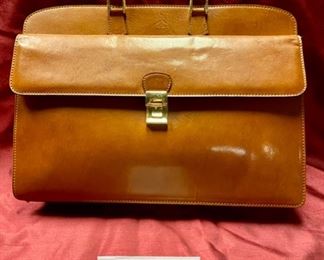 Lot 5114. $110.00 Alessandro Vananzi Genuine Brown Leather Women's Briefcase with Front Flap Compartment and Zipper Top, Made in Italy. 16" W x 3" D x 12" H.  This Italian  Designer bag is a classic. 