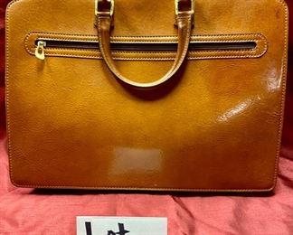 Lot 5114. $110.00 Alessandro Vananzi Genuine Brown Leather Women's Briefcase with Front Flap Compartment and Zipper Top, Made in Italy. 16" W x 3" D x 12" H.  This Italian  Designer bag is a classic. 