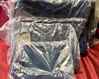 Lot 5118A/B. $50.00 Set of 5 Vintage Totes Nylon Luggage. This lot includes a Garment Bag, 2-Action Bag (18"x9"x9"), Shoulder Bag (14"x11"x7"), Tote Bag (10"x7"x2")