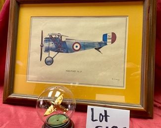 Lot 5120. $70.00  Vintage Airplane (Biplane) WWI Print Nieuport Ni. 17Print (19" W x 15" H) and Rare Mayflower Supermarine Spitfire 1939 in Glass Globe and wood base (w/original box).  Late addition:  Beautiful coffee table book entitled "Aviation".  Great 