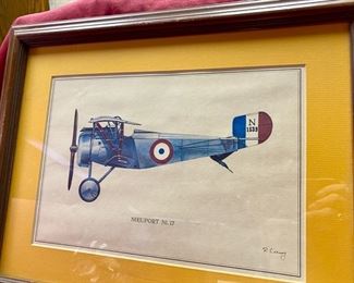 Lot 5120. $70.00. Vintage Airplane (Biplane) WWI Lot 5120. $70.00  Vintage Airplane (Biplane) WWI Print Nieuport Ni. 17Print (19" W x 15" H) and Rare Mayflower Supermarine Spitfire 1939 in Glass Globe and wood base (w/original box).  Late addition:  Beautiful coffee table book entitled "Aviation".  Great 