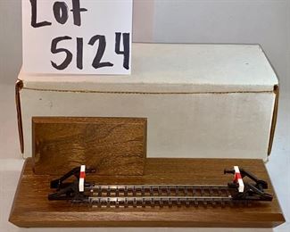 Lot 5124. $45.00  Pristine Vintage Marklin Locomotive HO BR 89 3000 (Made in Germany, #10057831) with display track on wood base. Locomotive doesn't have a box, but does have a plastic protective layer, parts list. 