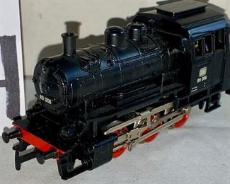 Lot 5124. $45.00  Pristine Vintage Marklin Locomotive HO BR 89 3000 (Made in Germany, #10057831) with display track on wood base. Locomotive doesn't have a box, but does have a plastic protective layer, parts list. 
