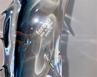 Lot 5140. $60.00 Murano Glass Dolphin by Formia Vetri Di Murano. Beautiful, clear and blue. Sold as is, has a chip in one of the fins, but it was too cool to not include. 16" H  x 10" D x 5"W   Has sold for $195 online, so our slightly injured dolphin is well-priced, as he is GORGEOUS.