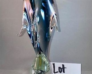 Lot 5140. $60.00 Murano Glass Dolphin by Formia Vetri Di Murano. Beautiful, clear and blue. Sold as is, has a chip in one of the fins, but it was too cool to not include. 16" H  x 10" D x 5"W   Has sold for $195 online, so our slightly injured dolphin is well-priced, as he is GORGEOUS.